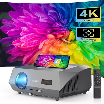 Auto Focus Native Resolution projector in silver gray with a blue lens, vented sides, remote and phone displaying 5G