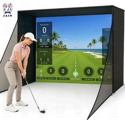 Golf Simulator Enclosure with a black frame, side netting and a large golf-course projection screen beside a golfer
