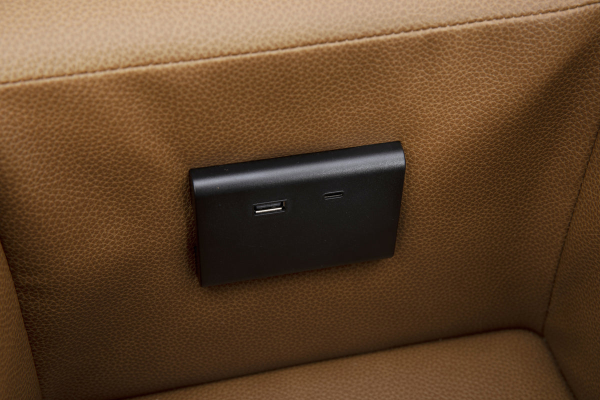 Rally Pro Caramel 6-Piece Power Reclining Sectional with caramel textured upholstery and a black USB charging panel