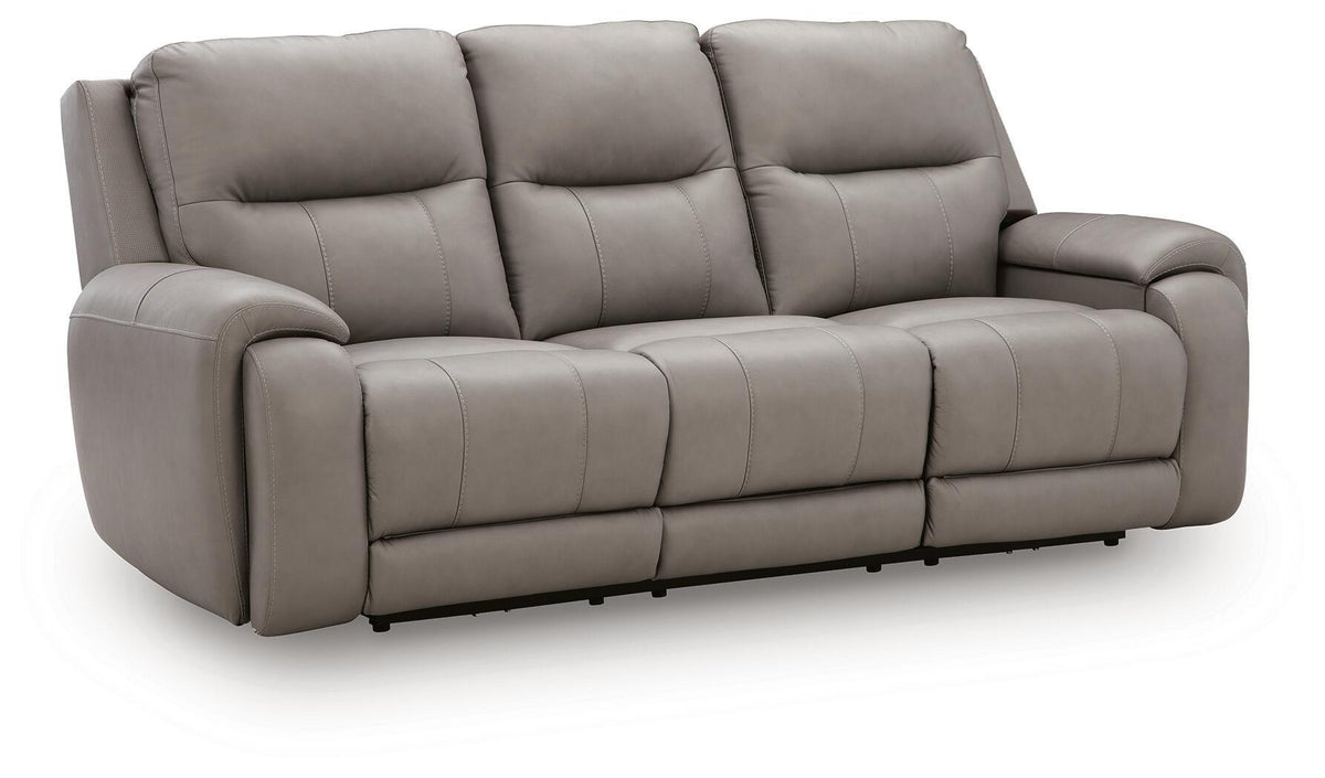 Real Moments power reclining sofa in ash gray leather with three plush seats, padded arms, and reclining footrests.