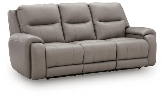 Real Moments power reclining sofa in ash gray leather with three plush seats, padded arms, and reclining footrests.