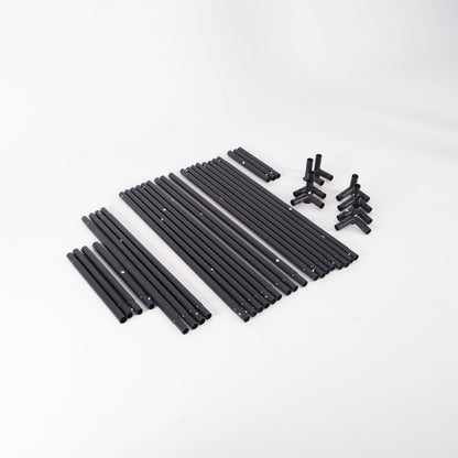 SimBox Golf Simulator Enclosure frame kit with black metal poles and connector fittings for assembly